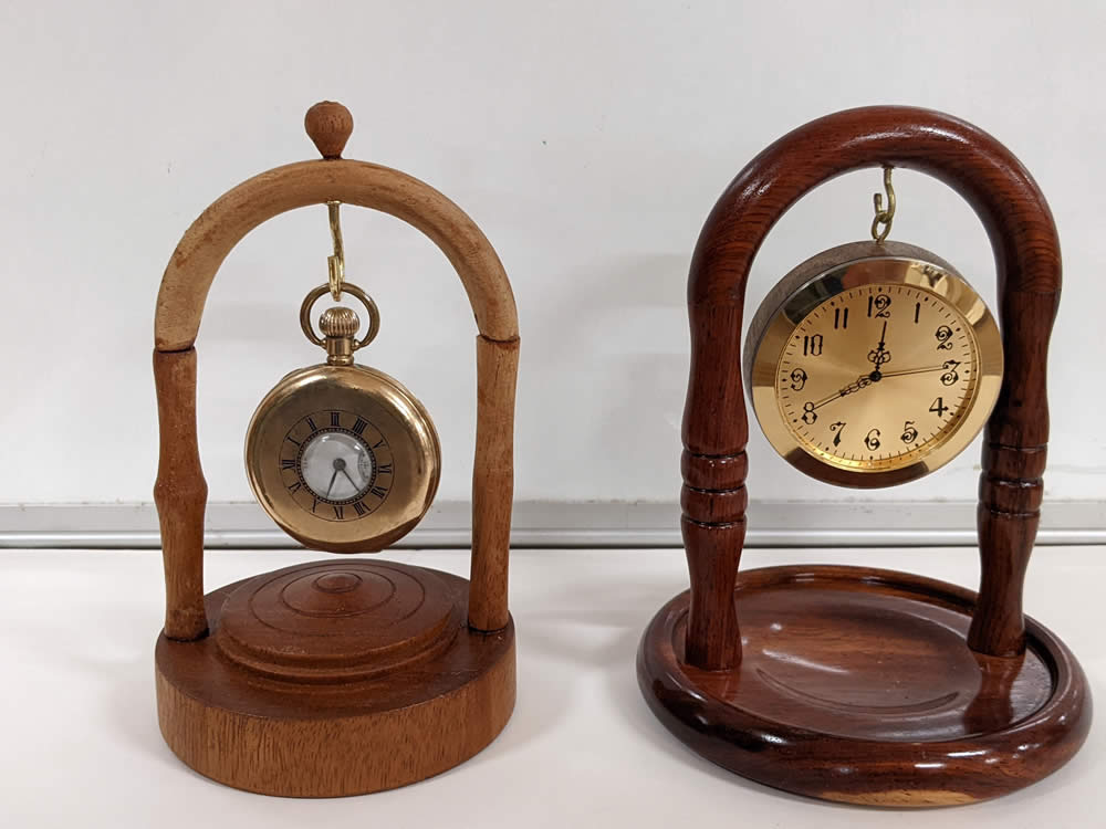 Watch-stands made by John Temple (left) and Mark Holloway (right)