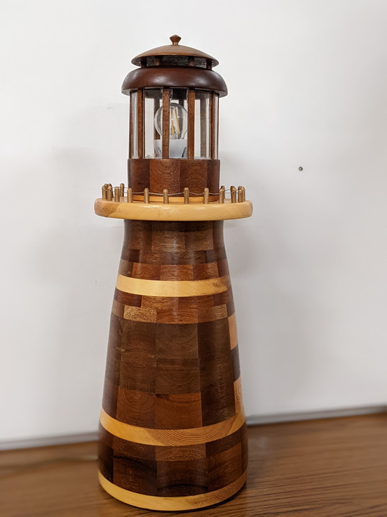 Lighthouse made from a mix of woods, by Mark Holloway
